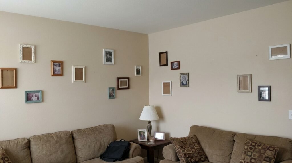 gallery of small mirrors arranged on a wall in a compact apartment